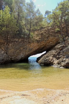 tripiti rocky beach with turquise sea on greece thassos island