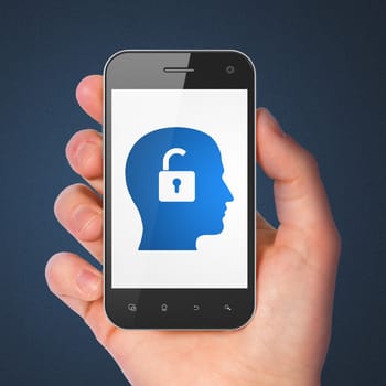 Finance concept: hand holding smartphone with Head With Padlock on display. Generic mobile smart phone in hand on Dark Blue background.