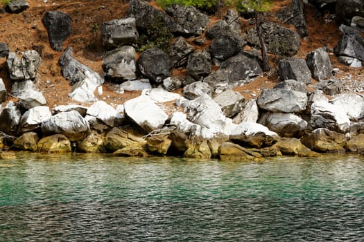 rocky beach with turquoise sea in greece thassos island