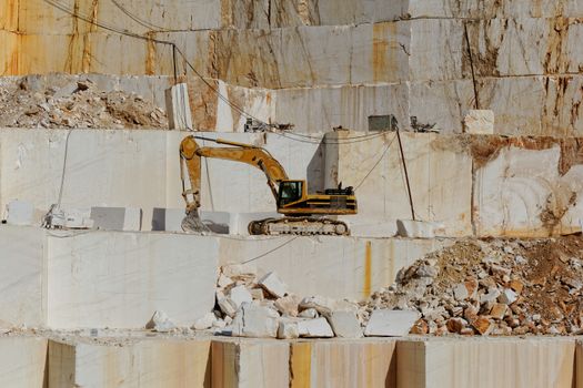 Detail of huge Thassos white marble quarry (mine) with grabber