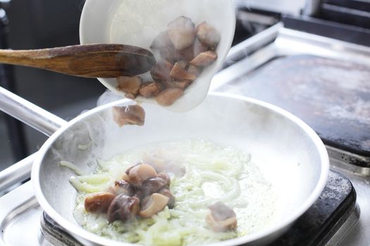 cooking of tasty food at the kitchen