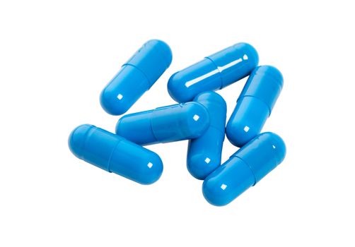 blue capsules on a white background