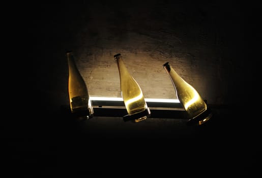 Champagne bottles with light.