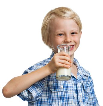 Smiling cute boy about to drink out of a bottle of milk. Isolated on white.