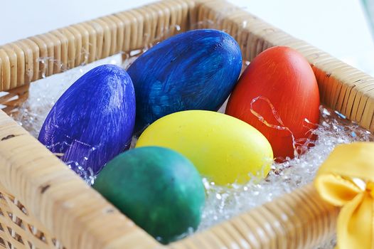 bunch of painted Easter Eggs in a basket