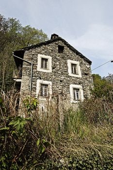 view of an Old abandoned rural house facade