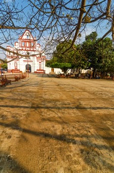 White colonial church and view of a plaza in Chiapa de Corzo, Mexico