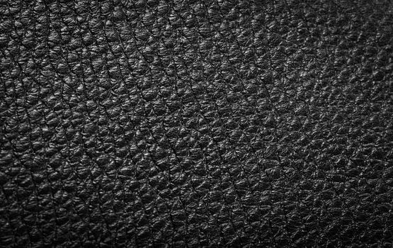 Macro view of black leather background