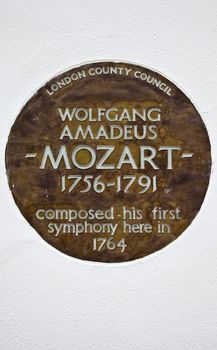 LONDON, UK - JUNE 4TH 2013: A plaque in London marking the place where Wolfgang Amadeus Mozart composed his first symphony.  Taken in Belgravia, London on 4th June 2013.