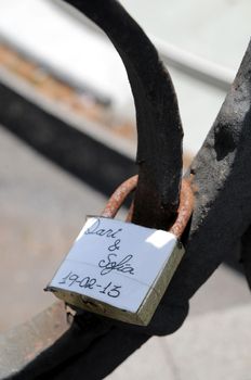 A Colored Metal Lover's Lock on a Bridge