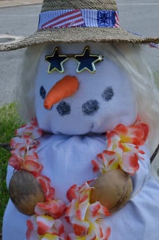 A Southeast Georgian fall scarecrow created to look like a snow woman but adorned with beach attire