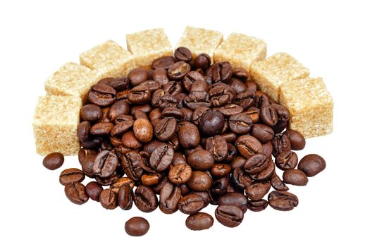 Coffee grains and refined sugar isolated on a white background, shot in studio