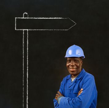 African American black man worker with chalk sign on a blackboard background