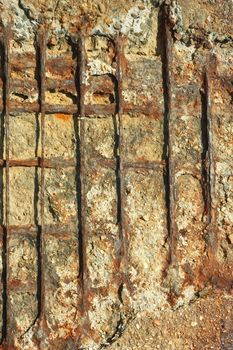 Detail of old outdated reinforced concrete structures with rusty iron rods outside