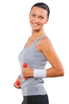 a sports woman holding weights isolated