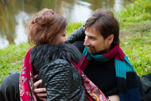 a man and a woman embracing the nature autumn