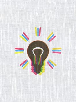 Finance concept: CMYK Light Bulb on linen fabric texture background, 3d render