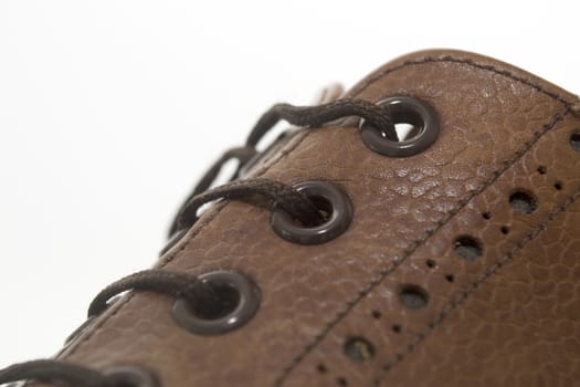 Detail image of a man brown shoe