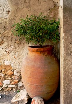 Old grey spanish pitcher for production wine in Chinchon, Madrid, Spain