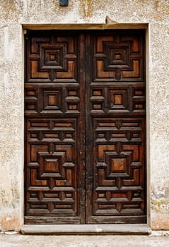 Old wooden entrance door in Chinchon