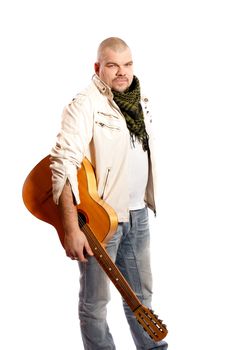 serious middle years man with a guitar on a white background