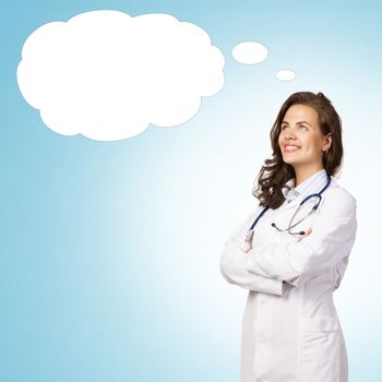 young woman doctor thinks cloud over his head, place for text