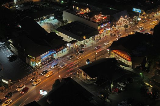 GATLINBURG, TENNESSEE - OCTOBER 5: Aerial night view of Gatlinburg, Tennessee on October 5, 2013. Gatlinburg is a major tourist destination and gateway to the Great Smoky Mountains National Park.