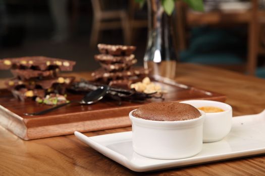 Delicious dessert with chocolate souffle and ice cream