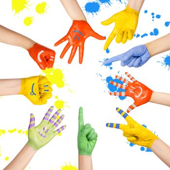 painted children's hands in different colors with smilies