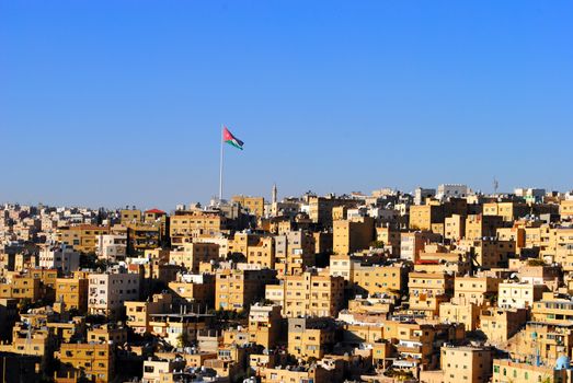 Amman (English pronunciation: /ɑːˈmɑːn/; Arabic: عمان‎ ʿAmmān ) is the capital and largest city of Jordan. It is the country's political, cultural and commercial centre and one of the oldest continuously inhabited cities in the world. The Greater Amman area has a population of 2,842,600. The recent economic growth experienced in Amman is unmatched by any other Arab city except those located in the Gulf.