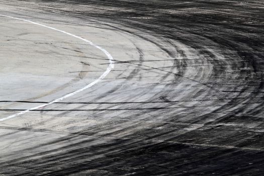 Background with tire marks on road track