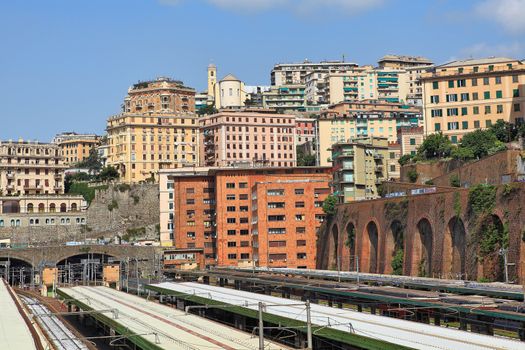 Residential urban buildings above railway central station in city of Genoa, Italy.