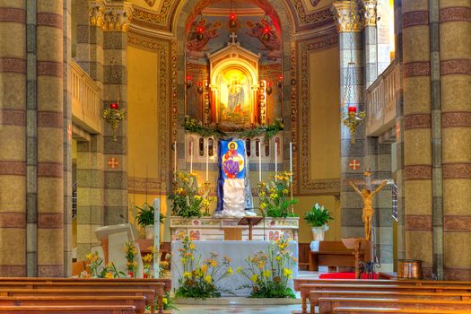 Altar as part of interior view of  Madonna Moretta catholic church in Alba, Northern Italy.
