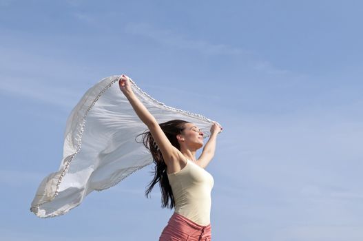 woman with flying scarf