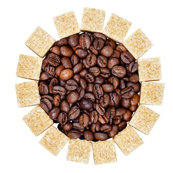 Coffee grains and refined sugar isolated on a white background, shot in studio