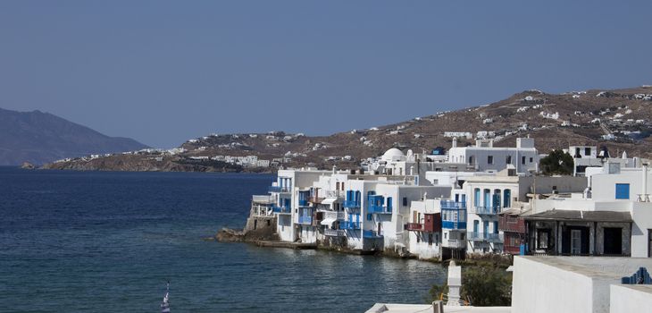 View on mysterious Mykonos city and a sea, Greece