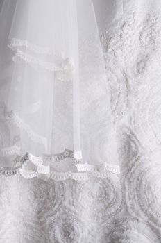 close up detail of a white wedding gown