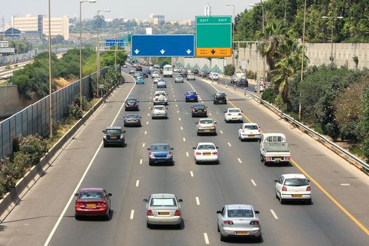 Traffic flow on freeway during rush hour in Tel Aviv, Israel.