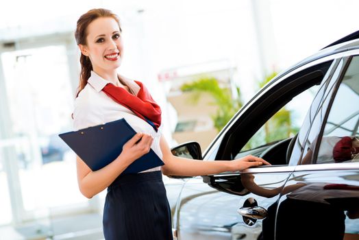 portrait of a young woman in a showroom consultant