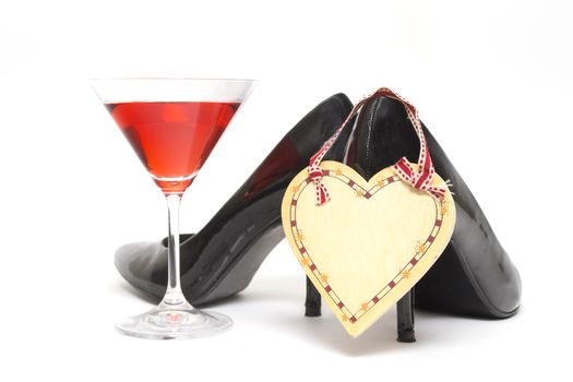 Girls night out concept with shoes, drink and lipstick