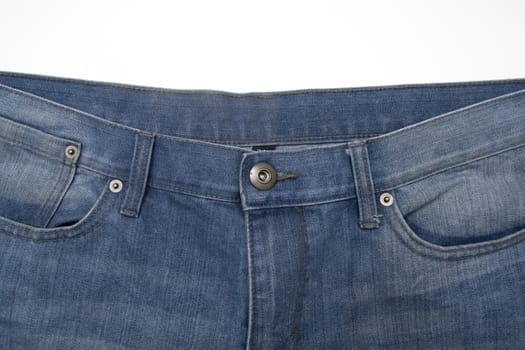 Close up image of denim jeans pocket with a ripped hole