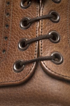 Detail image of a man brown shoe