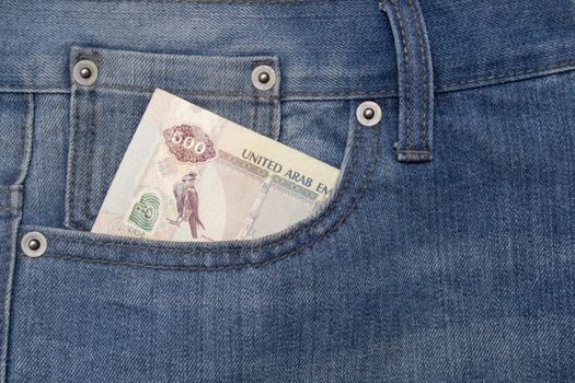 Denim jeans pocket with five hundred dirhams