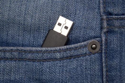 USB device in a denim jeans pocket