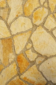 Background of a large stone wall texture (yellow)