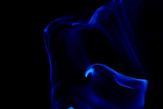 blue smoke in black background