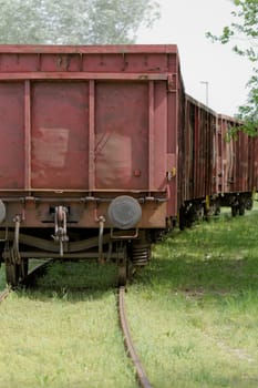 Old wagon, in an unused grassy railway track