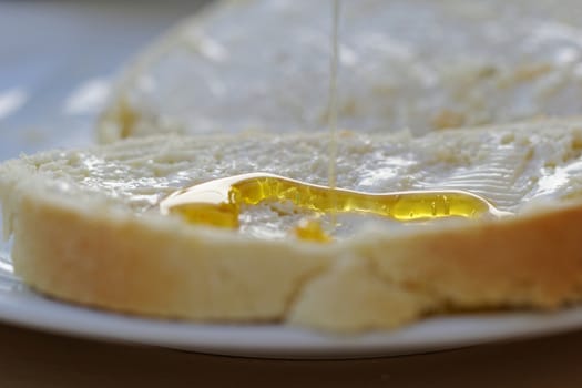 bread with honey and butter as breakfast