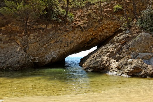 tripiti rocky beach with turquise sea on greece thassos island