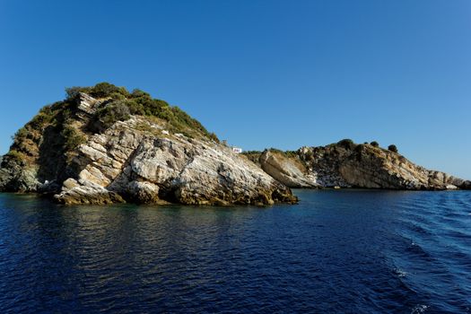 rocky beach with turquoise sea in greece thassos island